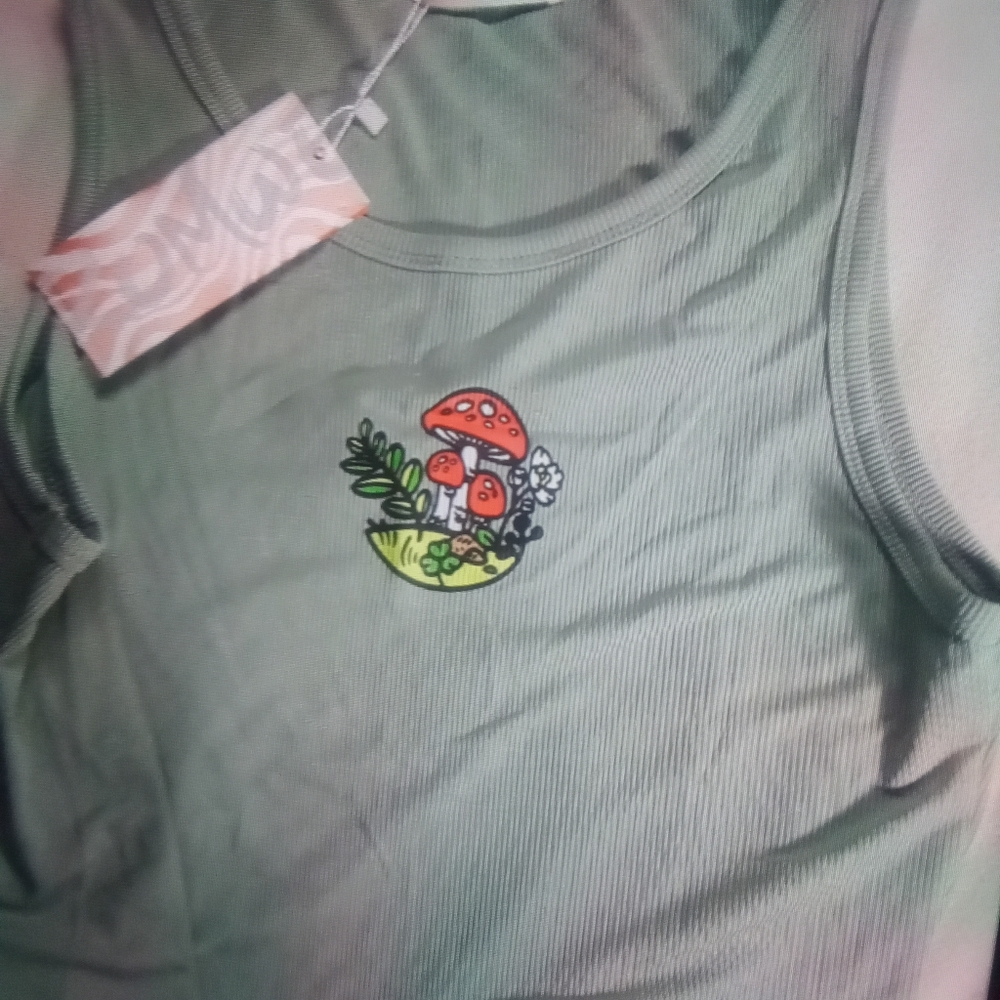 Crop tank top with mushrooms.